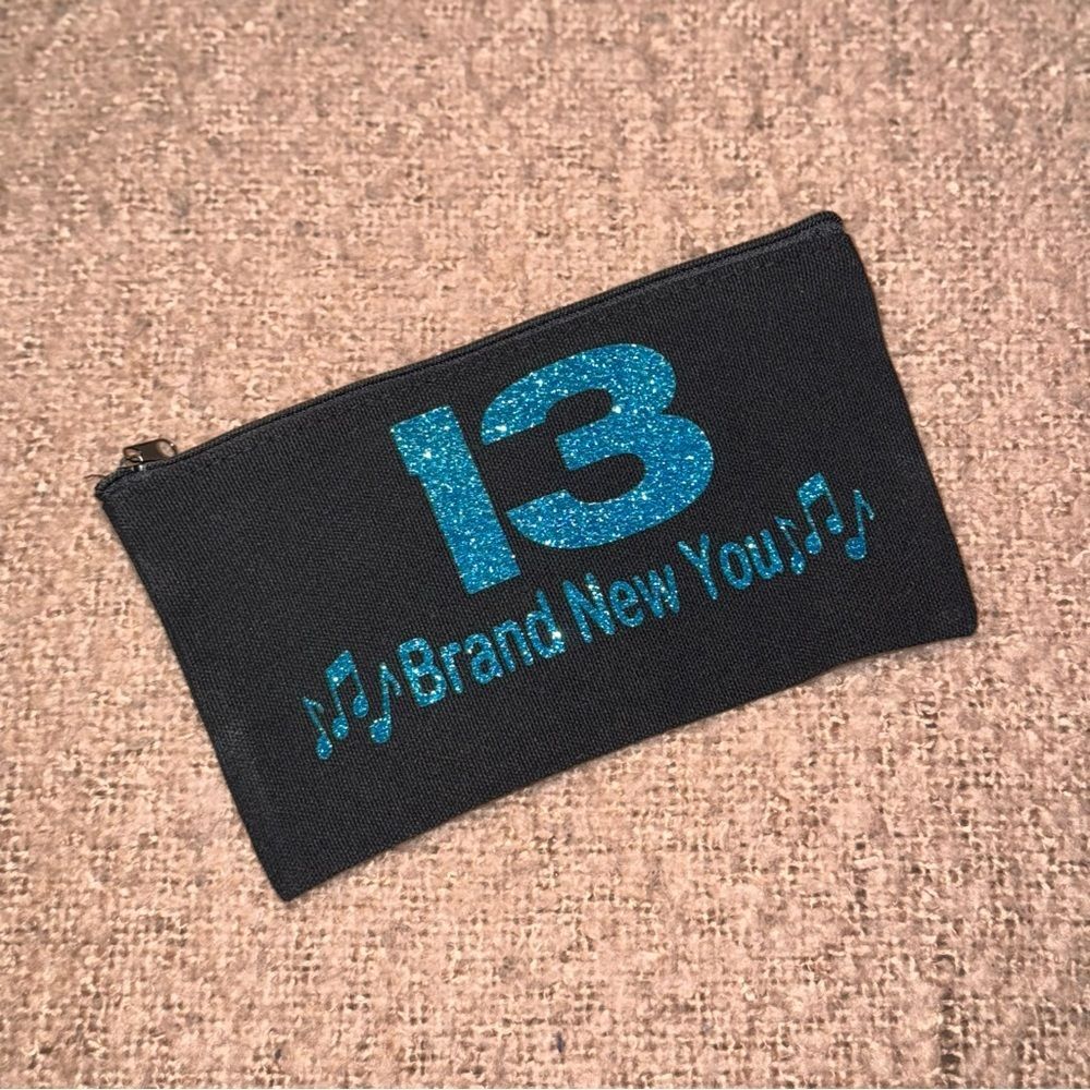 13 brand new you black blue glitter pouch bag NEW